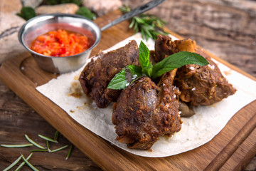 Pork or beef on the bone. Delicious juicy steak beef or pork. A big piece of grilled meat