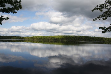 Obraz na płótnie Canvas landscape with lake and clouds