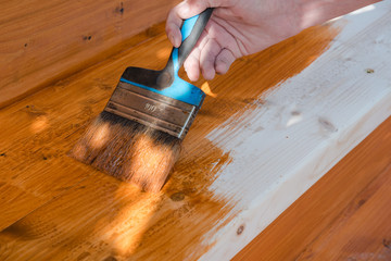 Paint the porch with orange paint. Decorate the terrace. Paint the boards with a wide brush. To make repairs.