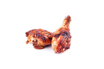 Roasted chicken legs isolated on a white background