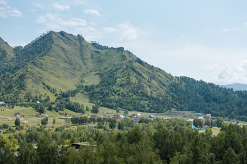 Fototapeta premium beautiful view of the mountains. green mountains. forest in the mountains. Gorny Altai in Russia. Leisure. Tourism development.
