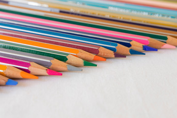 colored pencils and white background