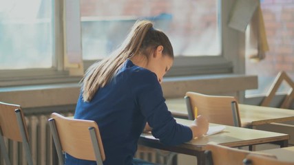 University student studying hard for exam