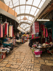 View of Street With Many Street Vendors with Merchandise for Sale