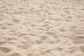 Closeup brown sand on the beach