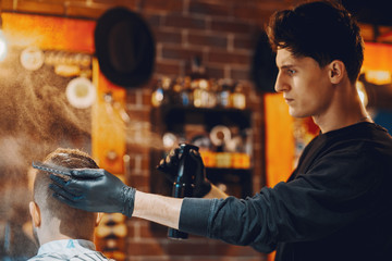 Man with a beard. Hairdresser with a client.
