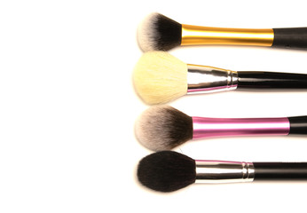 a set of brushes for makeup in different colors