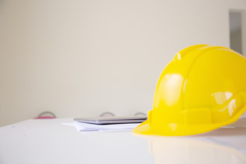 Desk of Architectural working project in construction site,With drawing equipment concept.