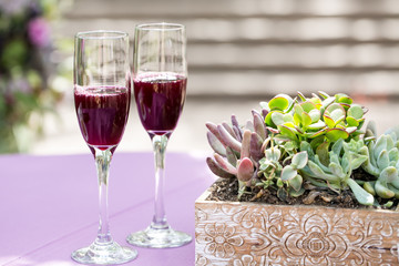 drinks on a table with cactus flowers 