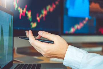 Business Team Investment Entrepreneur Trading discussing and analysis graph stock market...