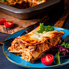 spicy lasagne with tomato sauce and basil