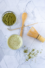 Matcha green latte tea with coconut milk. This latte is a tasty way to enjoy the energy and health benefits of a match. Matcha is a green tea leaf powder filled with antioxidants.