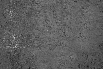 Texture of a concrete wall with cracks and scratches which can be used as a background