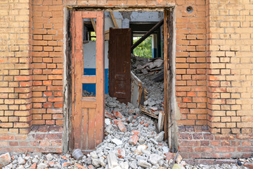wall collapsed house. destruction brick building