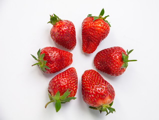 Ripe fresh strawberry on white background. Fruits close up.