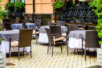 Chairs and tables in a cozy street cafe