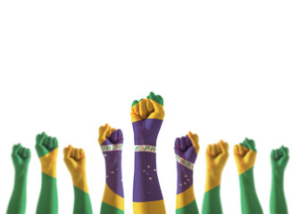 Brazil flag on people hands with clenched fists raising up for labor day national holiday...
