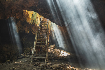 Mystical Neverland Bat Cave Lombok Goa Buwun Prabu Indonesia. Three rays bat cave - obrazy, fototapety, plakaty