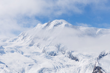 Scenic view on snowy mountains in cloudy day, view on snowy Matterhorn, Zermatt, Switzerland