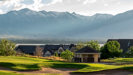 Panorama frame Golf course and residential area overlooking the lake mountain and valley