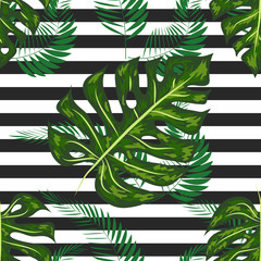 Exotic summer print. Seamless stripe pattern with tropical leaves. Jungle background.