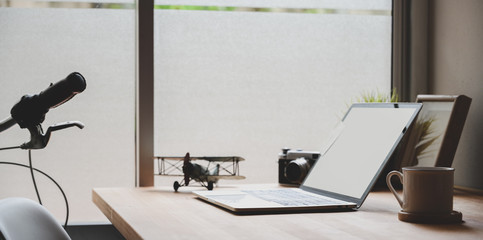 Comfortable photographer workplace with laptop computer,