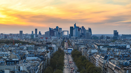 Paris France aerial view city skyline sunset at La Defrense and Champs Elysees street