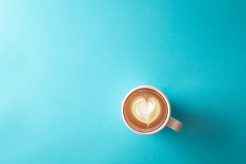 cup of coffee on blue background