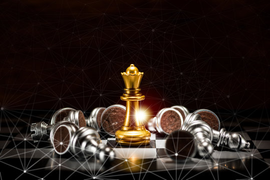 gold queen chess surrounded by a number of fallen silver chess pieces and abstraction connection line network screen , business strategy concept