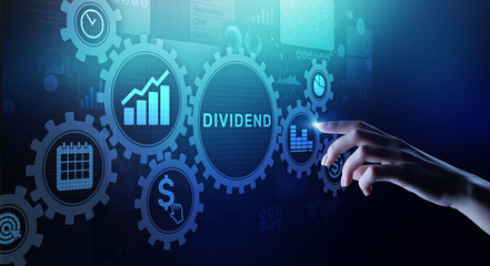 Dividends button on virtual screen. Return on Investment ROI financial business wealth concept.