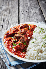 Beef Stew with rice on a plate