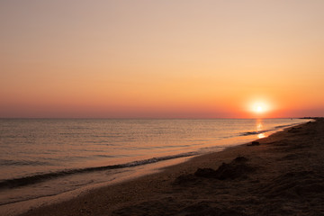 Fototapeta premium Summer sea at sunset. seascape background. summer evening landscape. sea waves. summer sunset. black sea