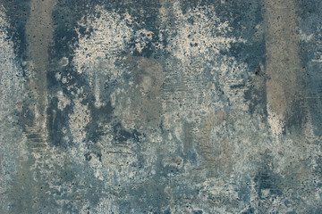 Abstract grunge background. Old cracked concrete with smudges. Gray, blue white colors.