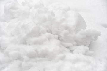 Block of white snow. Winter background.