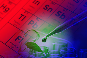 double exposure of science laboratory test tubes and periodic table , duo tone technic