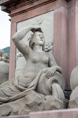 Fototapeta na wymiar Figure on Carl Theodor Bridge, Heidelberg