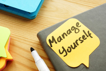 Manage yourself quote on a piece of paper. Self Leadership.