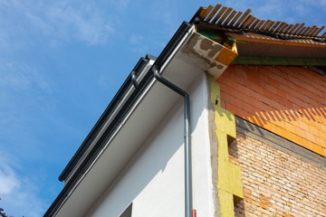 New roof on white building