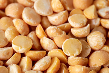 Close up picture of yellow split peas, selective focus.