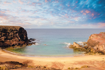 beautiful landscape of a lagoon surrounded by cliffs