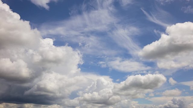 Beautiful blue and white cloudy sky background. Real time full hd video footage.
