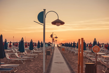 Sunrise on a beach in Rimini, Italy.