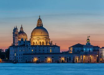 Fototapeta na wymiar Church Basilica di Santa Maria della Salute in Venice, Italy under sunset