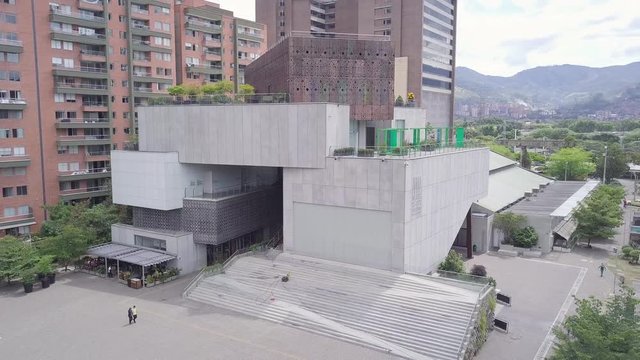 Slow panorama 4k aerial shot of Museum of Modern Art in Medellin downtown