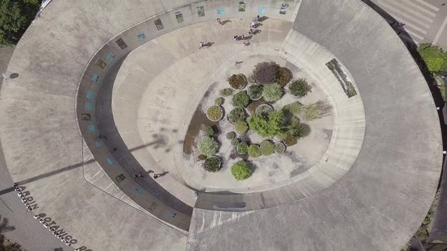 Stunning ascending aerial shot of Jardin Botanico, Medellin, Colombia, Parque Explora