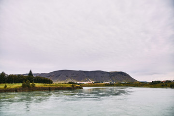 Lake in Iceland among the mountains. Summer