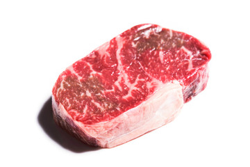 Fresh raw marble beef steak on background