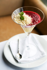 Desserts - Panna Cotta in cocktail glass on table