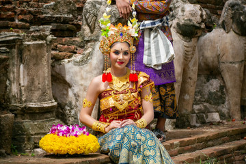 Fototapeta na wymiar Couple enacting wedding scene in preparation for religious ceremony.Bali. Indonesia