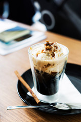 Grass jelly milk ice in glass on table